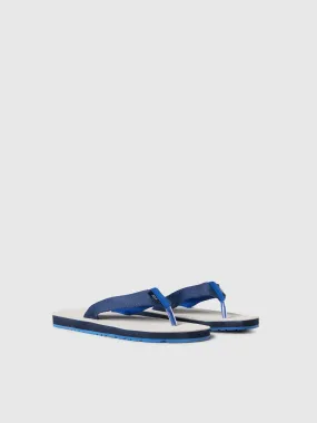 Monk suede flip flops