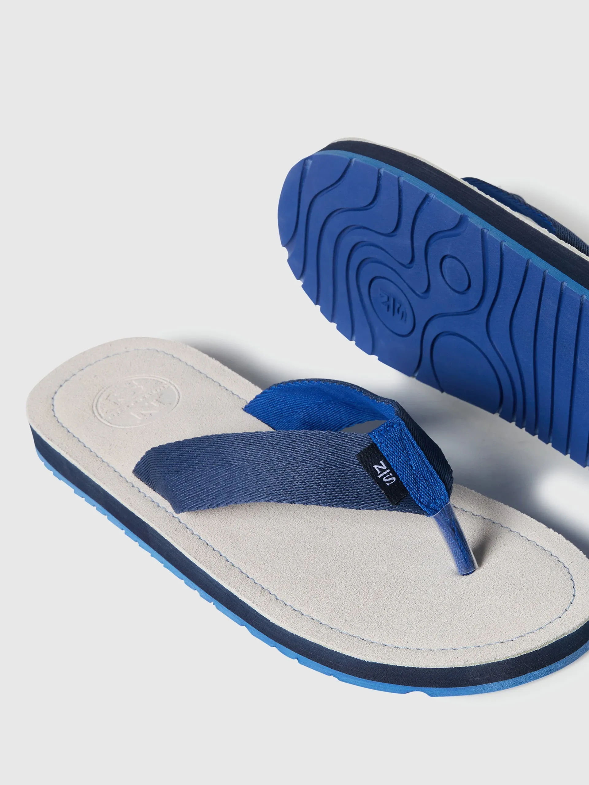 Monk suede flip flops