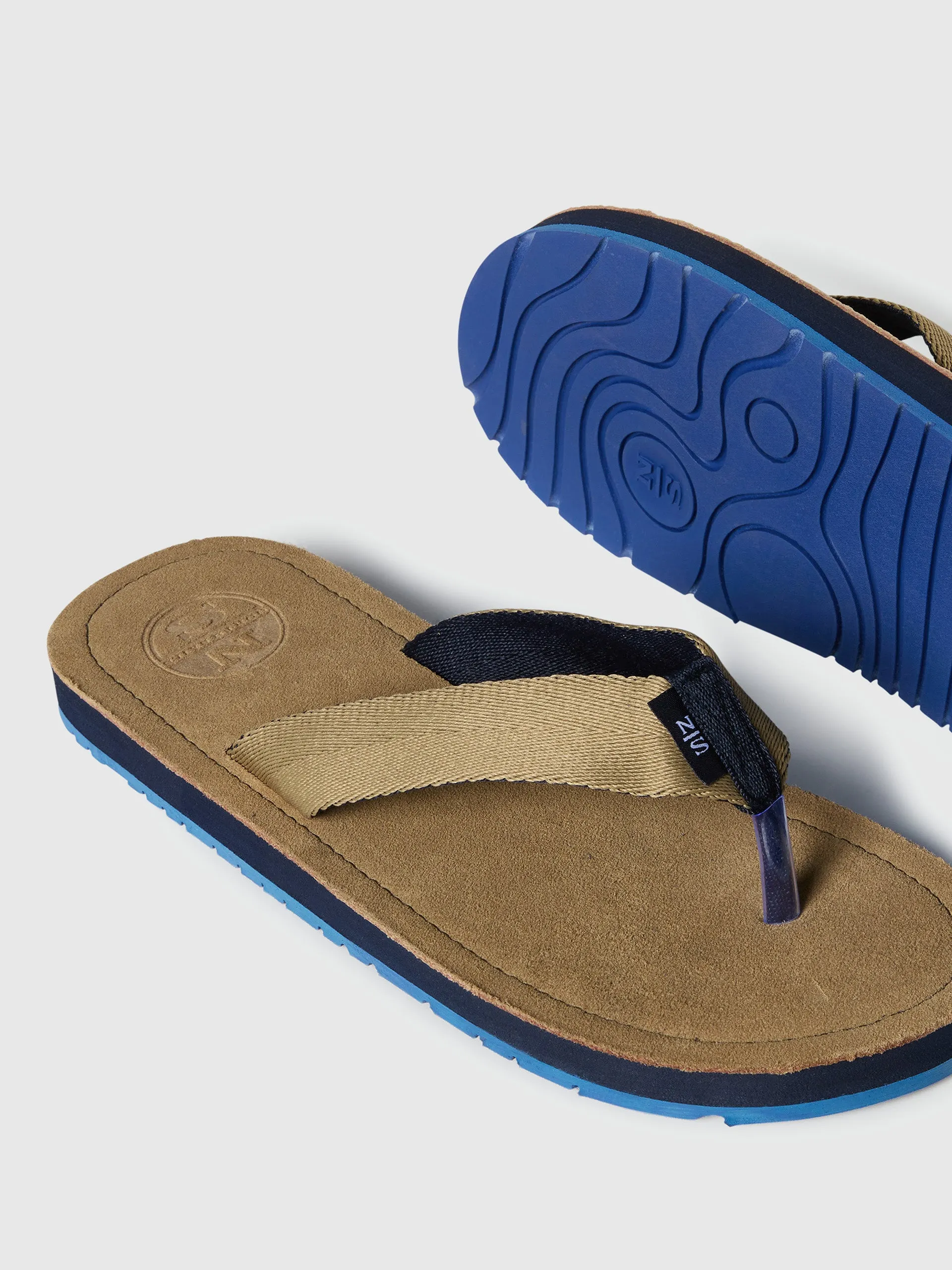 Monk suede flip flops